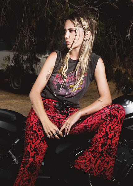 red snake flared pants 