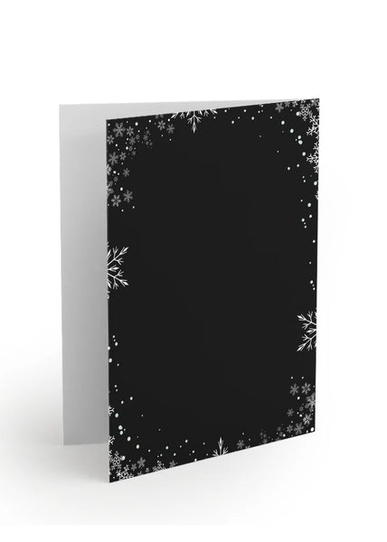 Black greeting card with white snowflake pattern on a white background