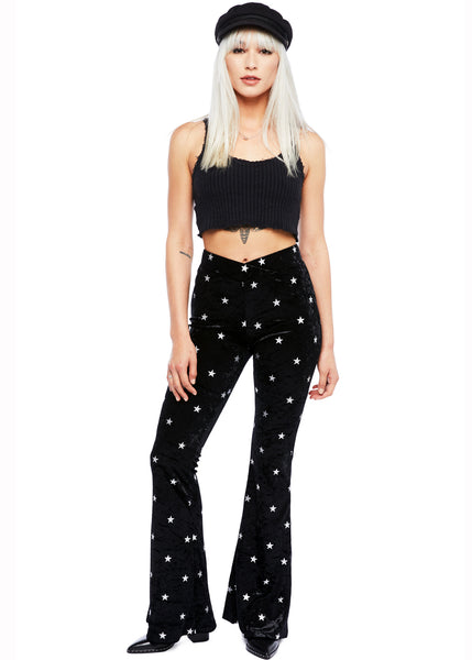 Black velvet star print flare pants